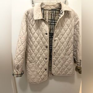 Quilted Burberry jacket .. size small but it can fit up to medium